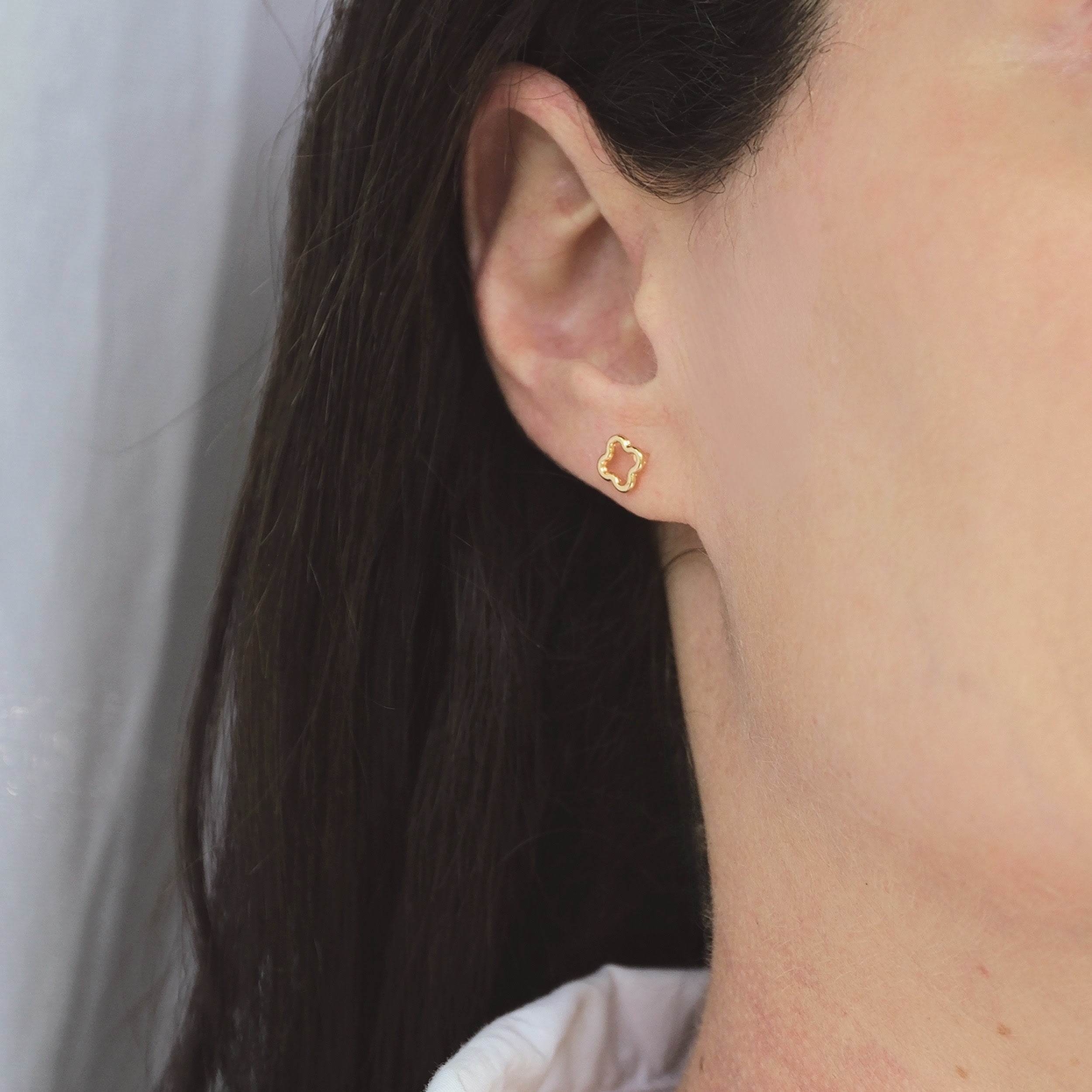 Small gold flower stud earrings