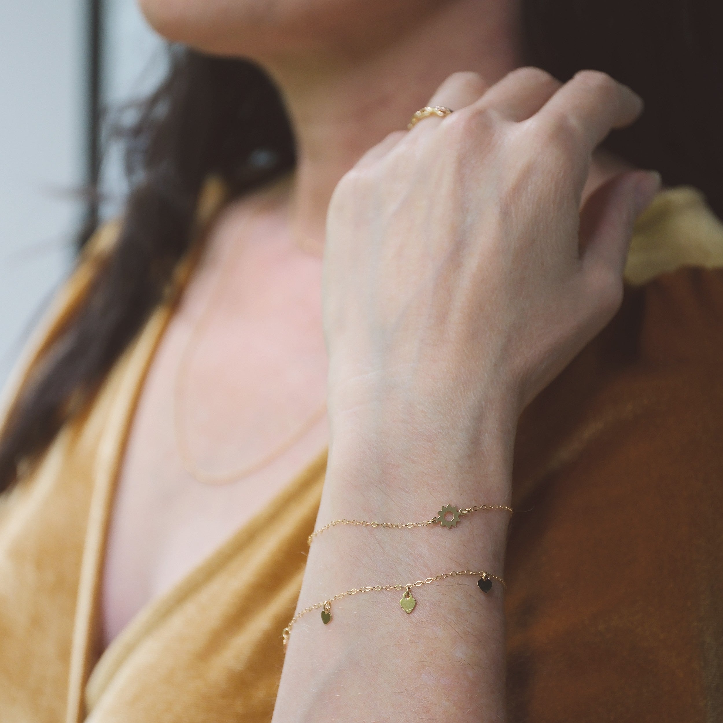 gold filled sun charm bracelet on delicate chain