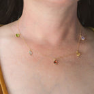 Gold necklace with amethyst, citrine, aquamarine, garnet and peridot drops