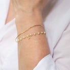 gold-filled pearl necklace with tiny heart pendant